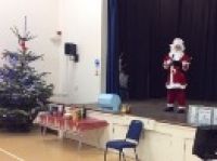 Santa making a special visit to the Christmas party